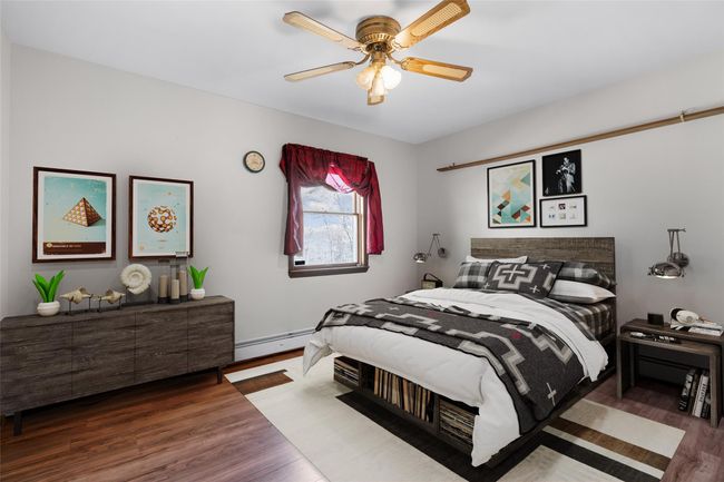 Virtually staged, 3rd bedroom with closet, window and ceiling fan | Image 15