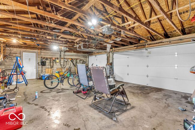 garage featuring a garage door opener | Image 45