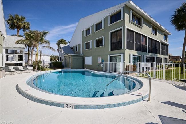 View of pool featuring a patio area | Image 20