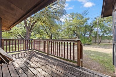 One of two back decks leading to a massive back yard | Image 3