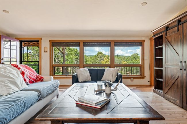 Living room with views to Pecos Wilderness | Image 7