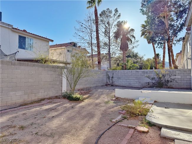 View of yard with a fenced backyard | Image 47
