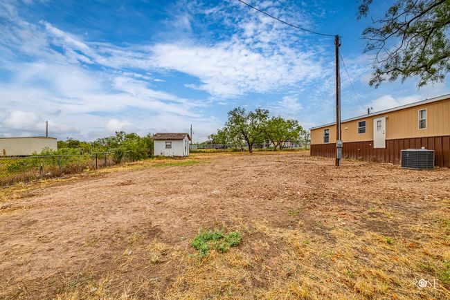 large fenced backyard | Image 24
