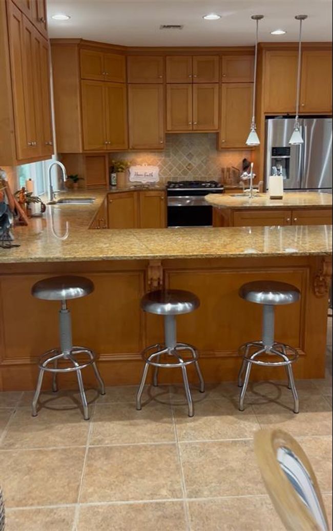 Large kitchen with three ovens | Image 8