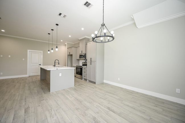 Dining Room Connected To The Island Kitchen & Family Living Room | Image 21