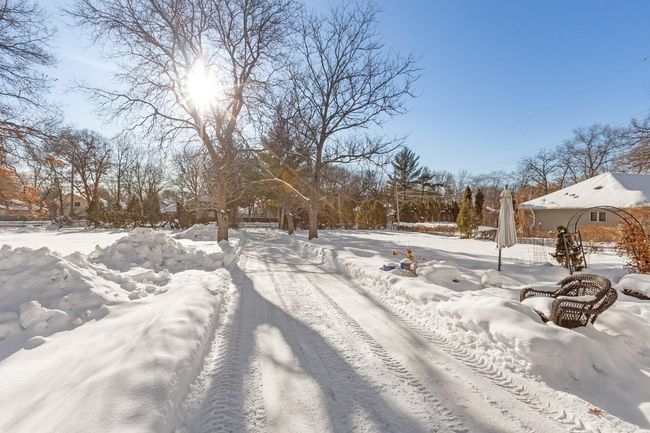 This home is set back on a gorgeous .71 acre lot | Image 4
