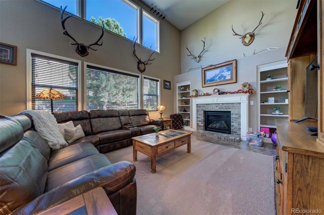 kitchen opens to family room w fireplace | Image 23