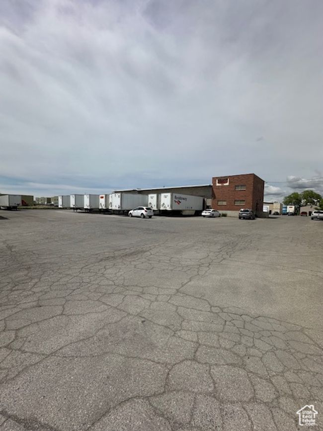 View of uncovered parking lot | Image 7