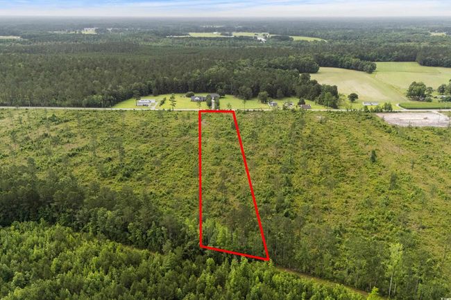 Overview of rural landscape featuring a forest and property boundaries highlighted | Image 17