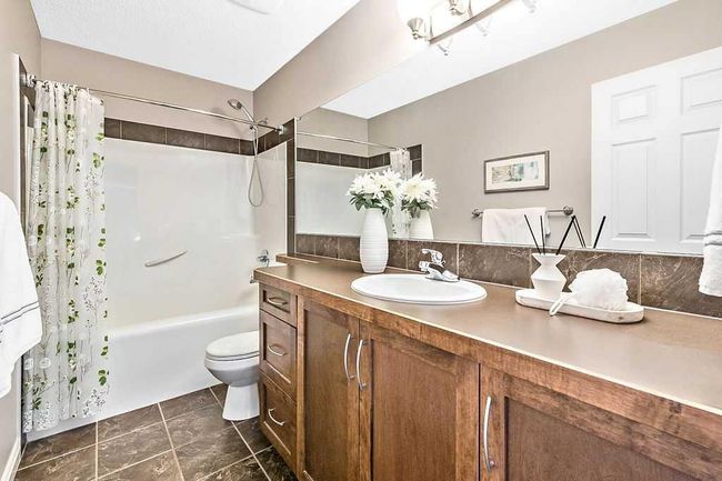 419 Cimarron Blvd, House other with 3 bedrooms, 3 bathrooms and 4 parking in Okotoks AB | Image 40