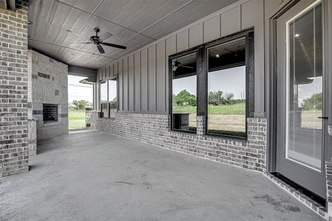 View of patio / terrace with ceiling fan | Image 27