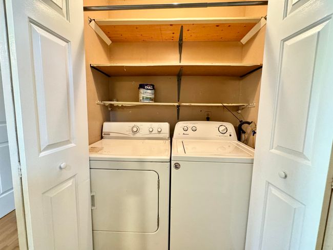 Laundry room featuring independent washer and dryer | Image 10