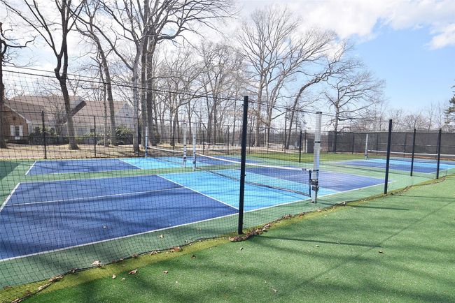View of sport court featuring fence | Image 16