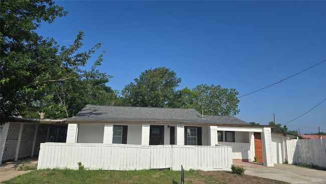 View of front of home featuring fence | Image 35