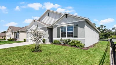 976 August Sky Drive, House other with 4 bedrooms, 2 bathrooms and null parking in Deltona FL | Image 2