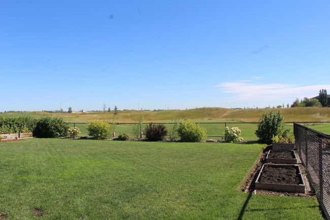 312 Boulder Creek Cres Se, House other with 3 bedrooms, 3 bathrooms and 6 parking in Langdon AB | Image 34