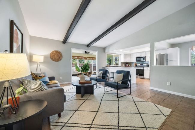 Living room flows into sunroom | Image 6