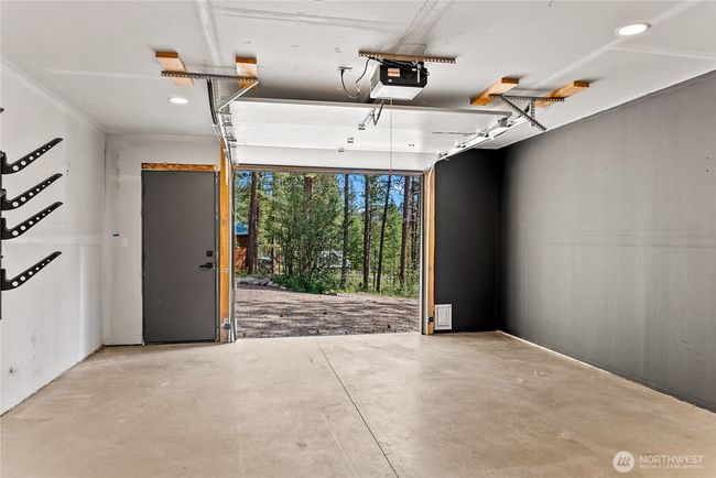 In the garage looking outside. | Image 40