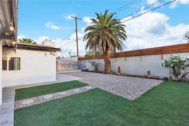 View of yard featuring a fenced backyard | Image 41