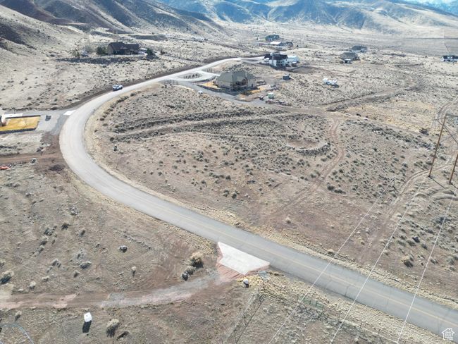 Aerial overview of property's location with a mountainous background and rural landscape | Image 6