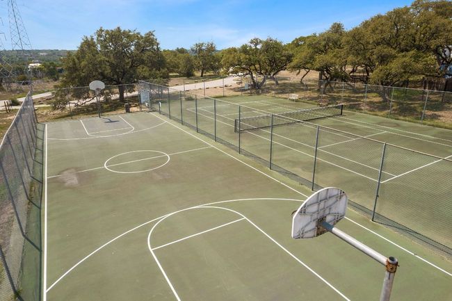 View of basketball court featuring community basketball court and fence | Image 35