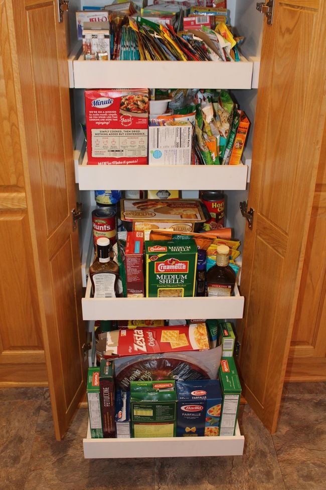 Pull out cabinets for easy access and space. | Image 39