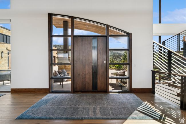 Entryway featuring hardwood / wood-style floors and baseboards | Image 23