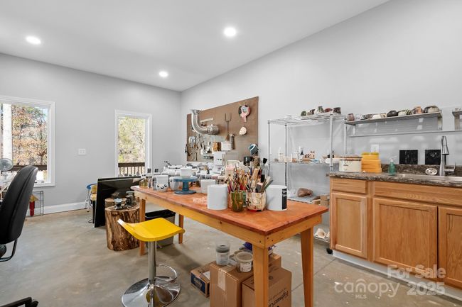 2nd Flex space room in finished basement. Currently used as an art studio. Exhaust fan installed for chemical fumes etc. | Image 26