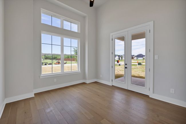 Flex Room/Office Doorway featuring french doorhardwood s, / wood-style floors, and a towering ceiling | Image 6