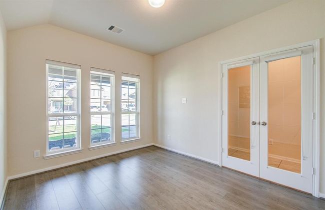 Study room/home office with French door. | Image 7