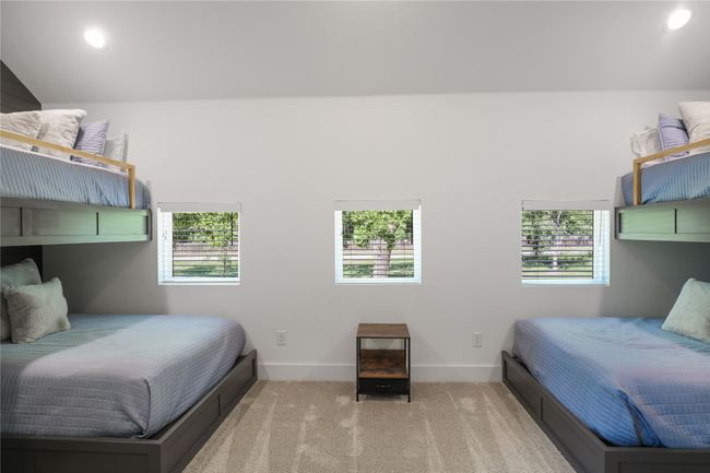 Bedroom with recessed lighting, baseboards, multiple windows, and carpet | Image 28