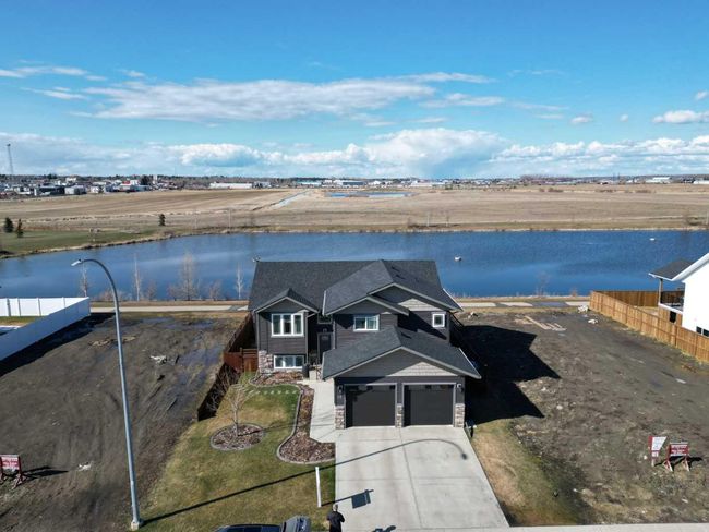 26 Mackenzie Ave, House other with 5 bedrooms, 3 bathrooms and 2 parking in Lacombe AB | Image 42