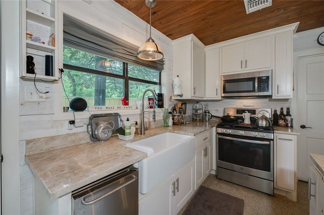Casita kitchen with view of enclosed patio | Image 38