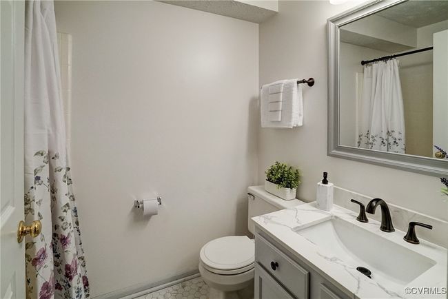 Totally Renovated Bathroom with Tile Flooring, Marble Vanity, Tub & Shower | Image 21