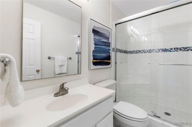 Primary bath with tiled shower | Image 20