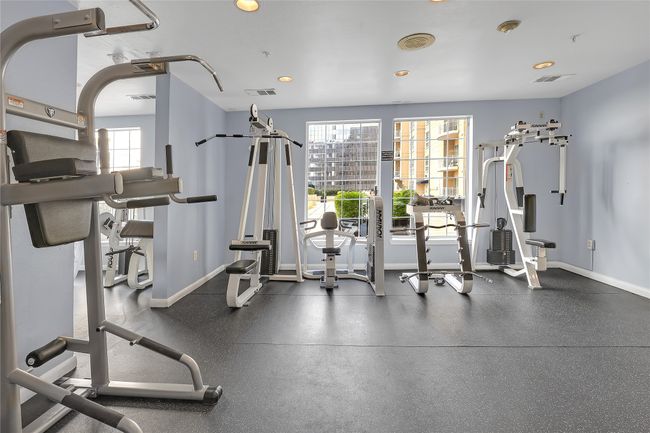 Workout area with plenty of natural light and recessed lighting | Image 19