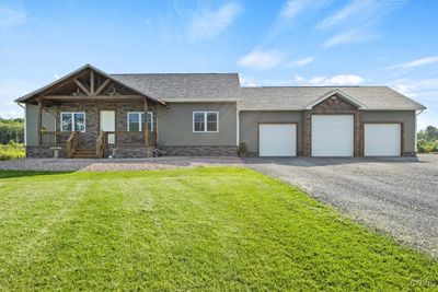 Welcome home to your 2022 custom built ranch home with finished exterior walkout basement, situated just outside of the village of central square! | Image 1