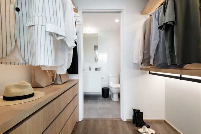 Bathroom featuring recessed lighting, wood finished floors, toilet, vanity, and baseboards | Image 5