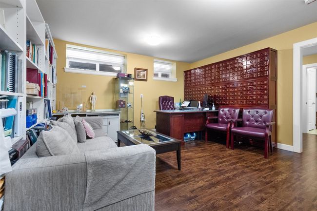 Office area with wood finished floors | Image 32