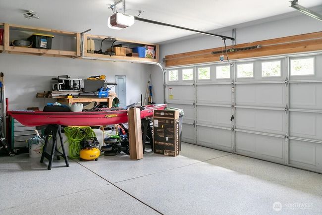 Direct entry to home from a garage that has been drywalled and epoxy flooring. Double car with plenty of space. | Image 24