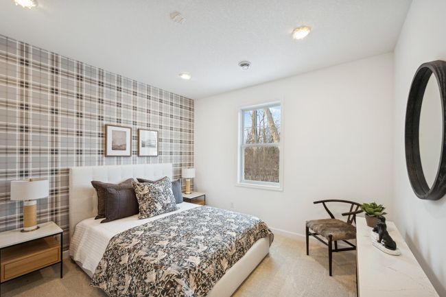 Photo is of the actual model. One of two secondary bedrooms! | Image 15