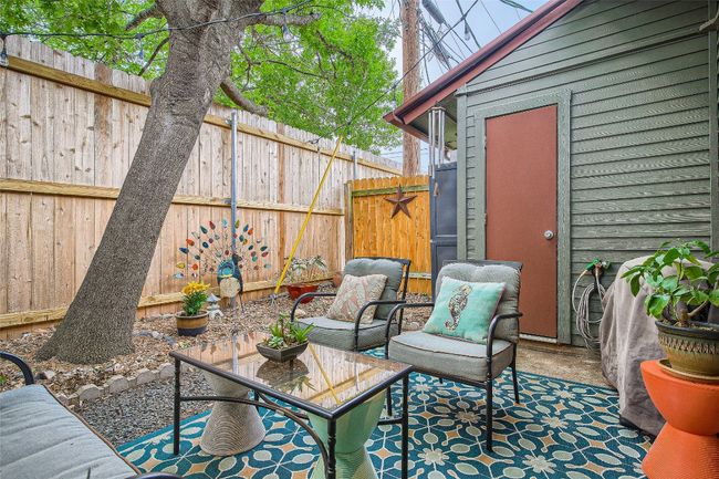 View of patio / terrace with an outdoor hangout area | Image 11