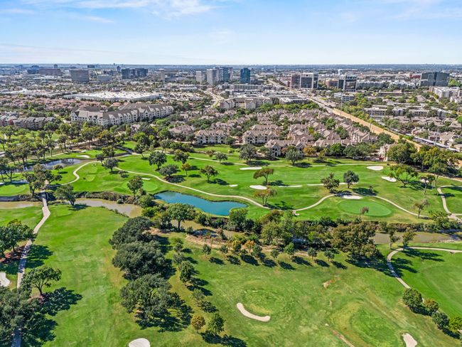 Birds eye view of property featuring view of golf course, a water view, and a view of city | Image 27