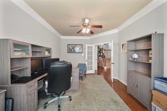 Designed as a study/home office, this flexible space could easily serve as a formal living room, child's play area, etc. | Image 9