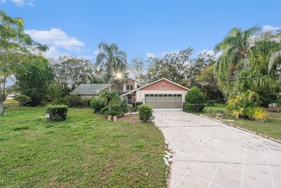 8188 Forest Oaks Boulevard, House other with 3 bedrooms, 2 bathrooms and null parking in Spring Hill FL | Image 3