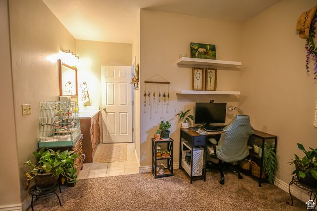 Office featuring baseboards and light carpet | Image 51