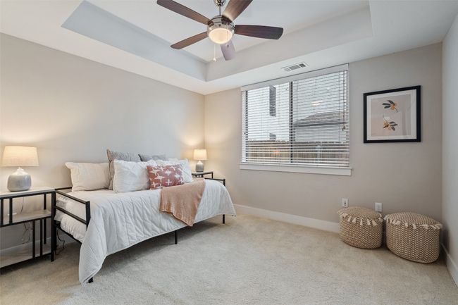 2nd bedroom with built-in accent shelving | Image 8