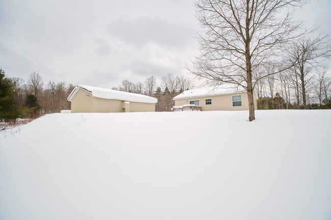 Back view of home and garage | Image 32