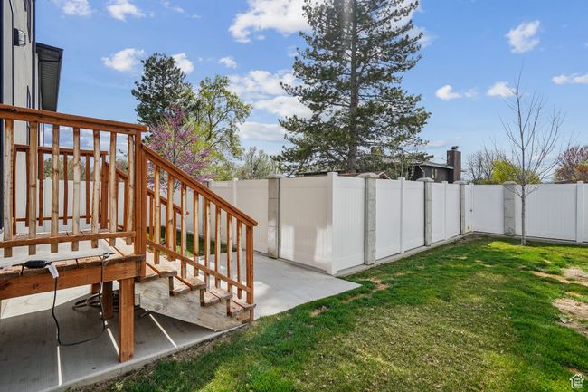View of yard with a fenced backyard, stairs, and a patio | Image 36