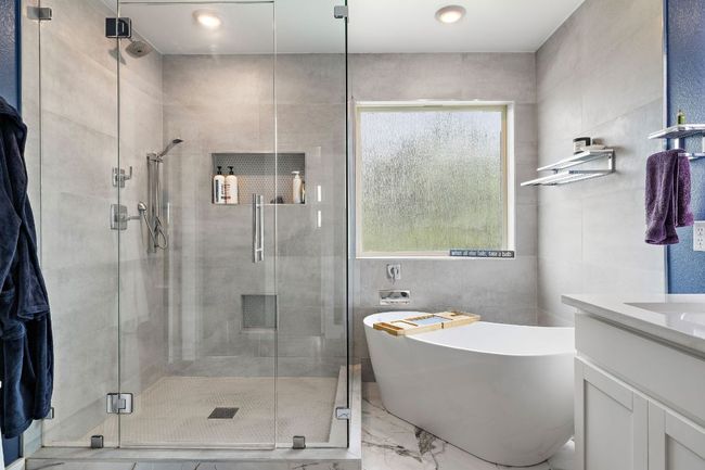 Custom remodeled Bath featuring a Soaking tub, Double vanity, Over-sized shower | Image 16